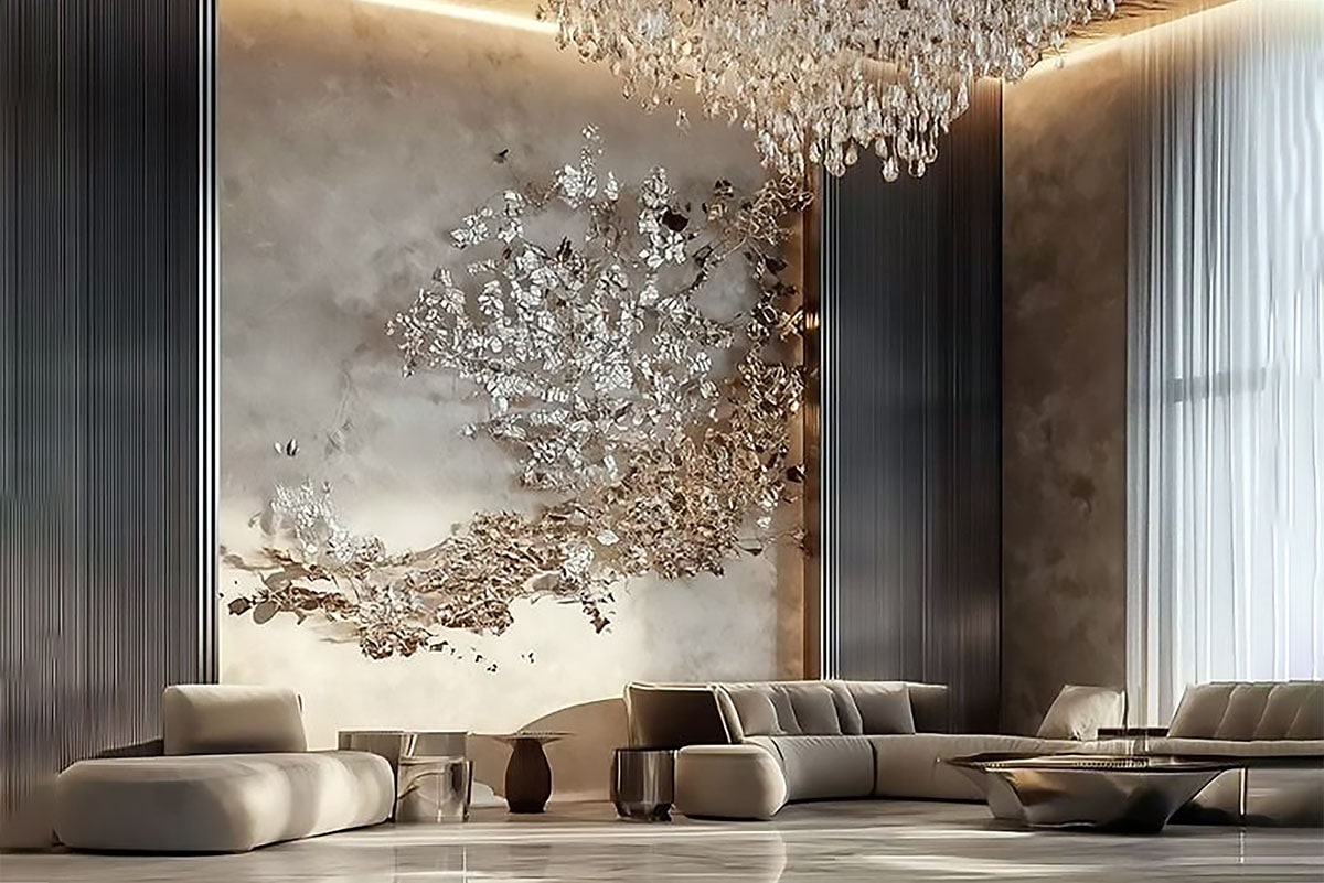Living room with silver branch wall sculpture, cream sofas and chandelier