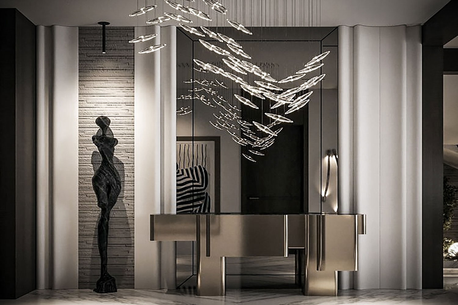 Foyer with brass console, disc chandelier and fluted wall panelling
