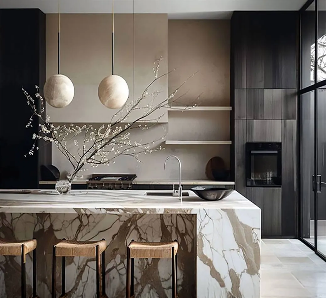 Kitchen with island, cabinetry and statement lighting
